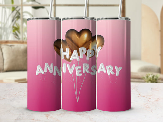 Pink gradient tumbler with "Happy Anniversary" in silver balloons and gold hearts.