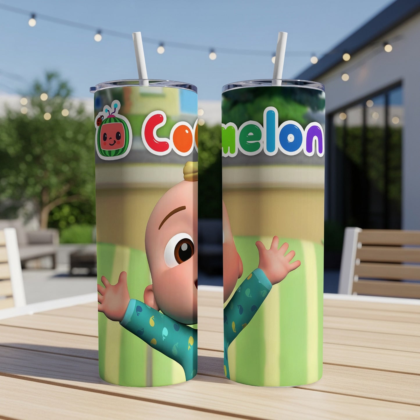 Two Cocomelon tumblers with JJ character on a table outdoors.