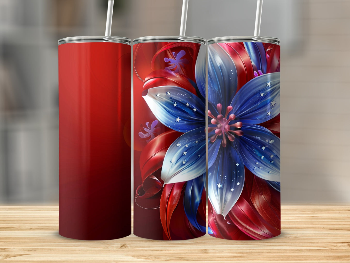 Red, white, and blue floral tumbler with straw.