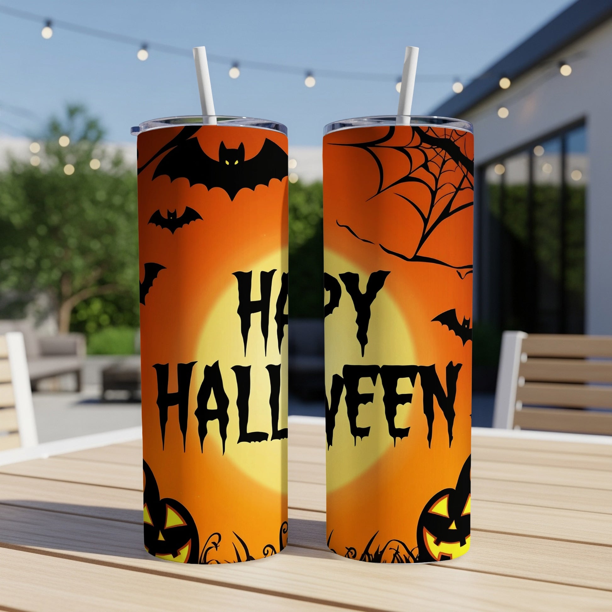 Halloween tumbler with bats, spiderweb, pumpkins, and text "Happy Halloween".