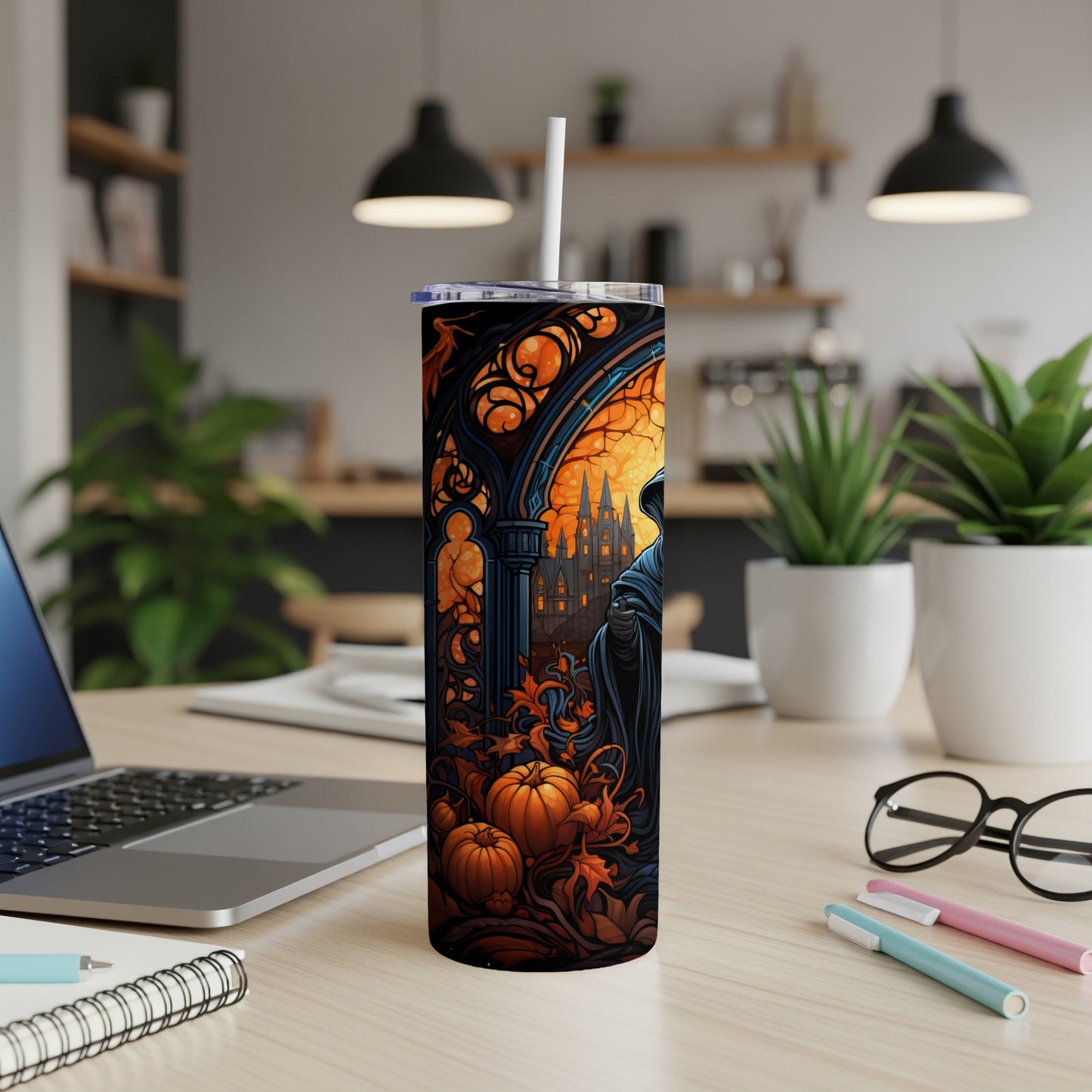 Halloween tumbler with gothic castle, hooded figure, pumpkins, and autumn leaves design.