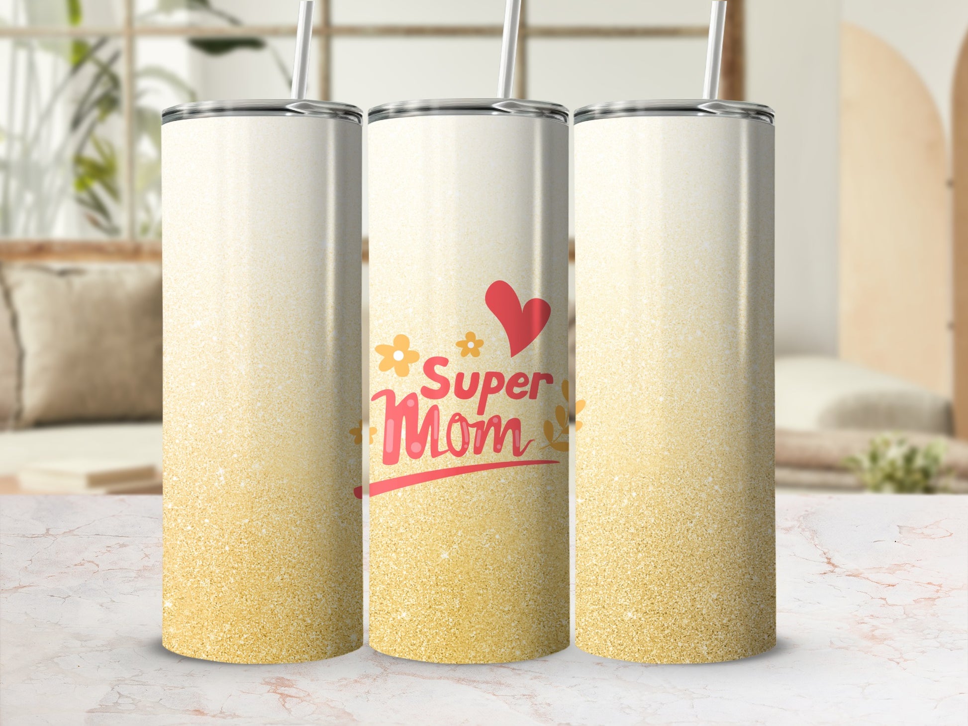 Gold glitter tumbler with "Super Mom" text and heart design.