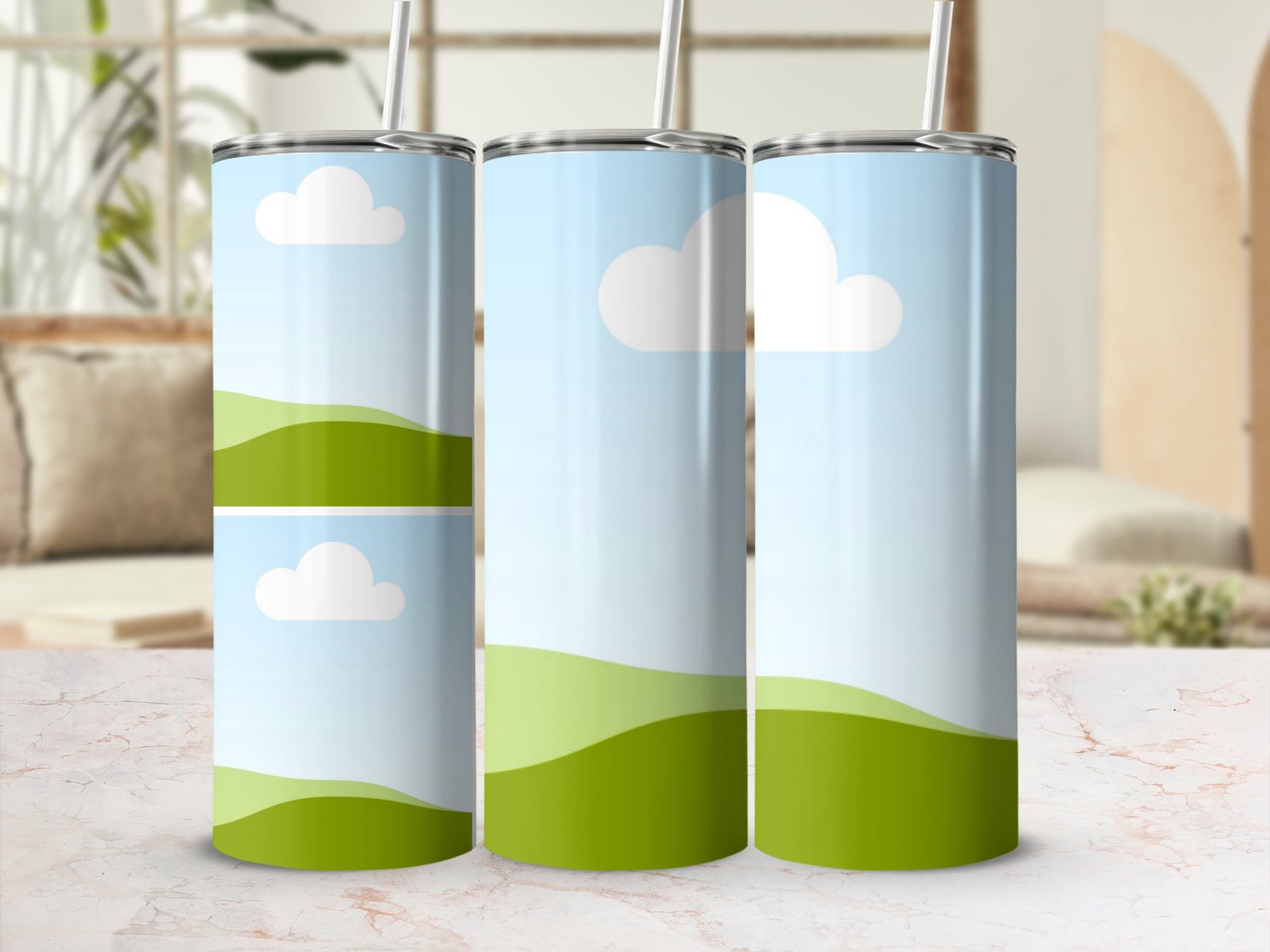 Three tumblers display a pastel sky with clouds and green rolling hills design.