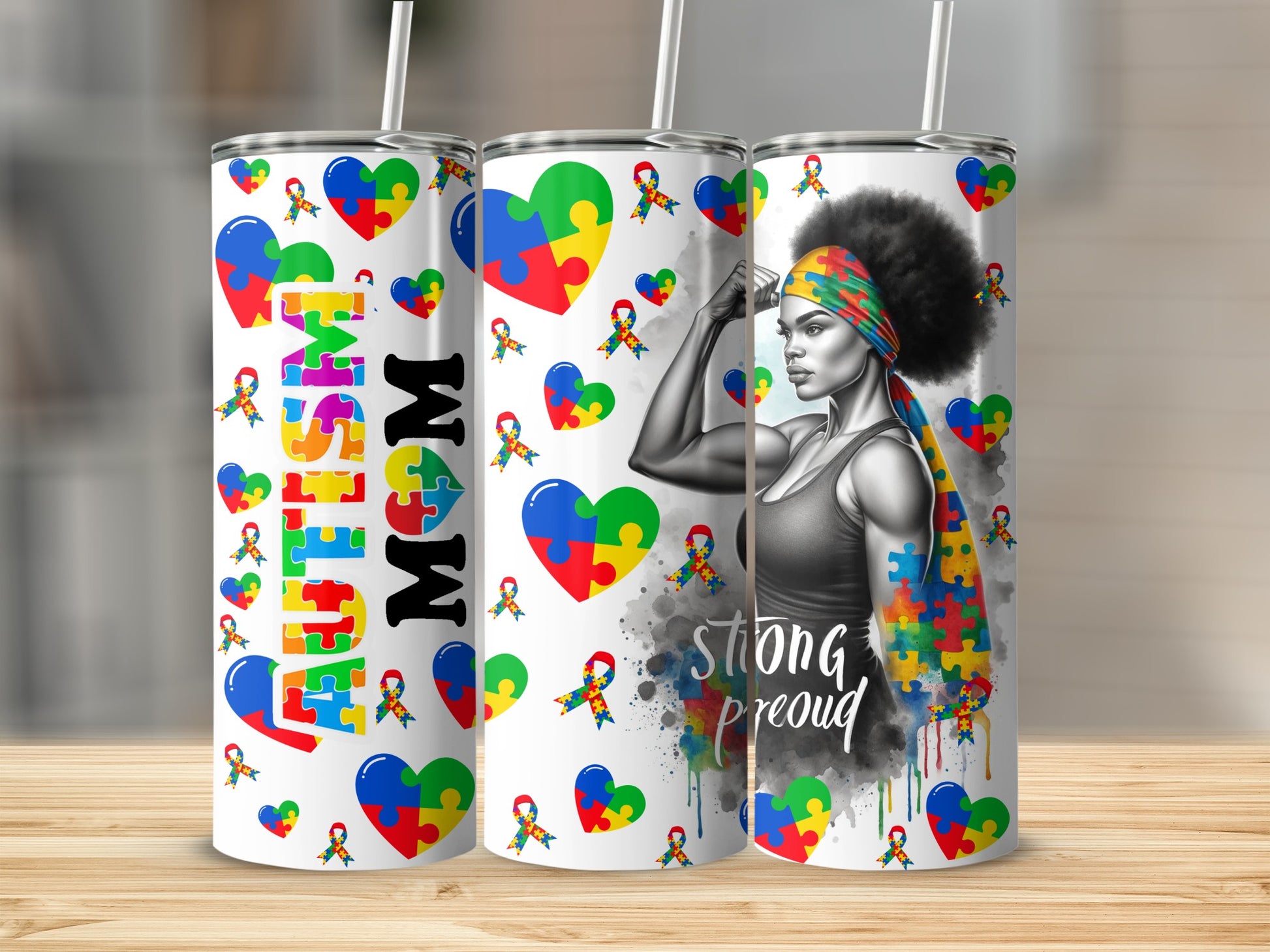 Autism awareness tumbler with puzzle piece hearts and strong woman graphic.