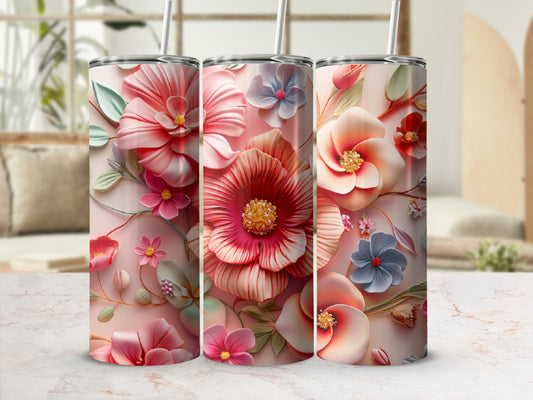 Three floral tumblers with pink, coral, and blue flowers.