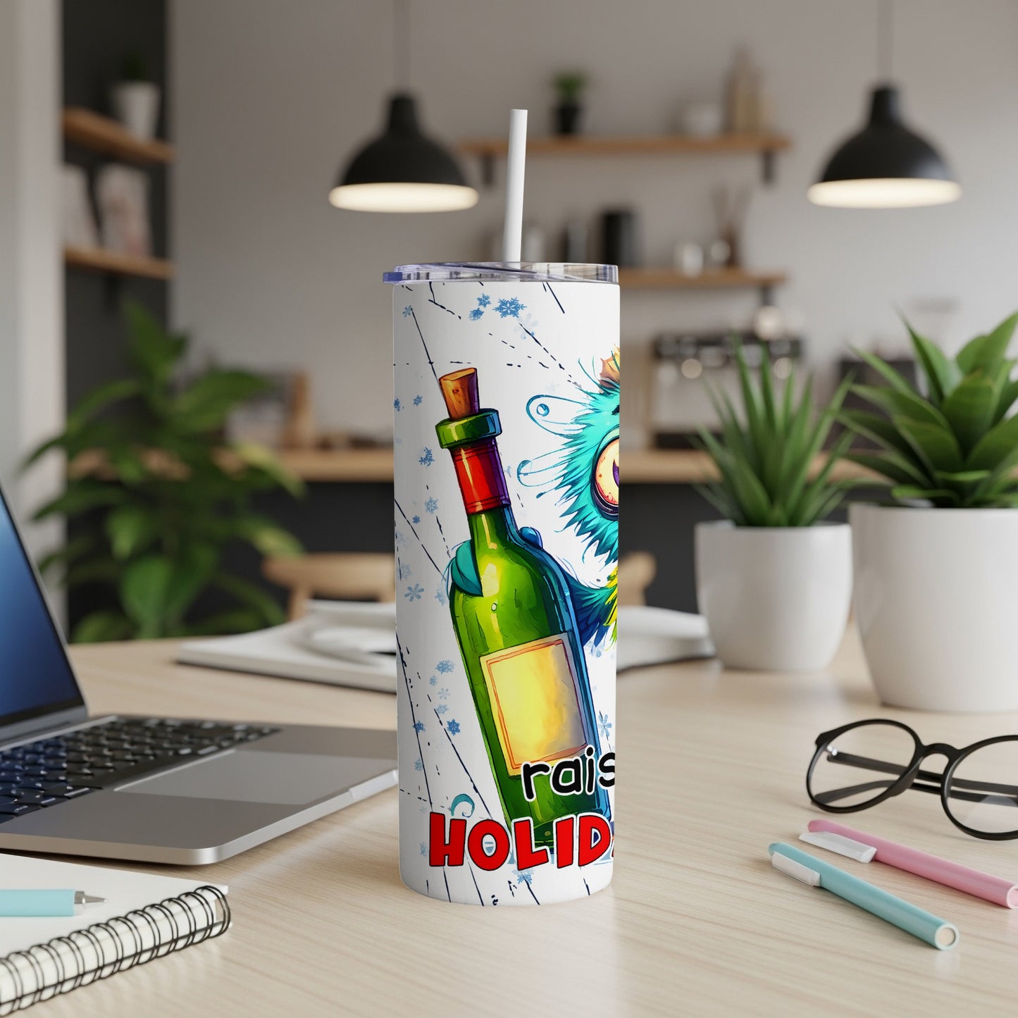 Tumbler with cartoon monster and "Raisin Holidays" text.