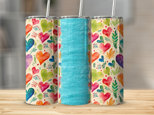 Three tumblers with colorful watercolor hearts and a textured blue band.