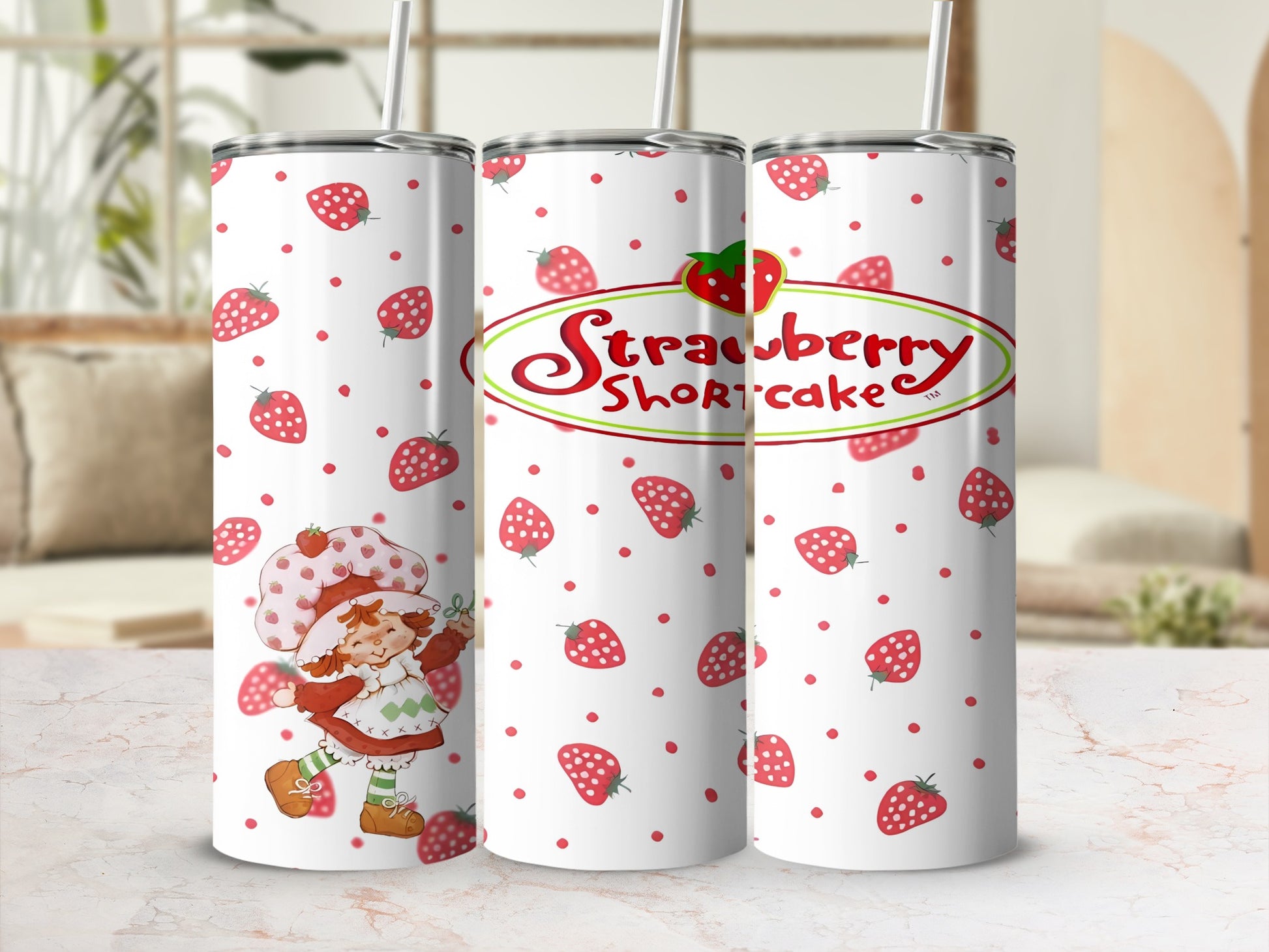 Strawberry Shortcake tumbler with repeated character and strawberry pattern.