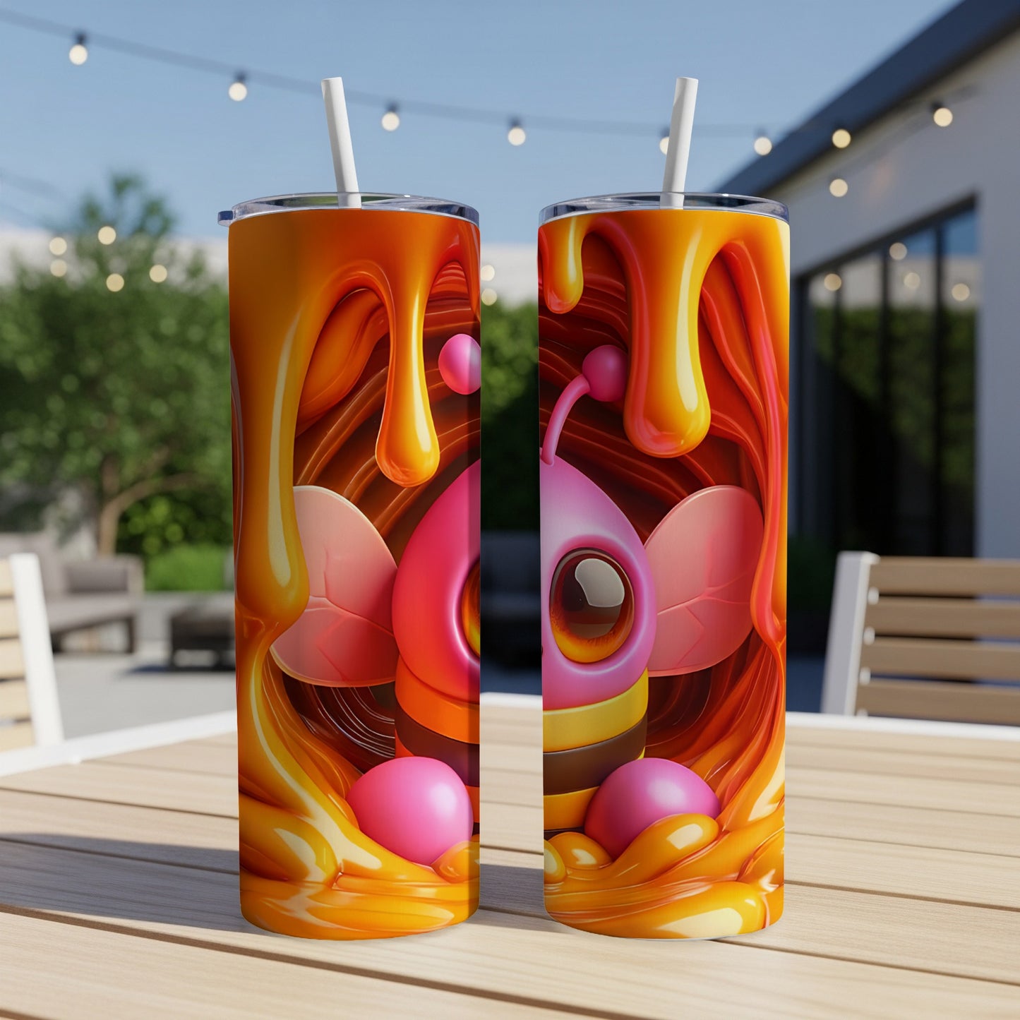 Two tall tumblers with a bee design, dripping with honey.