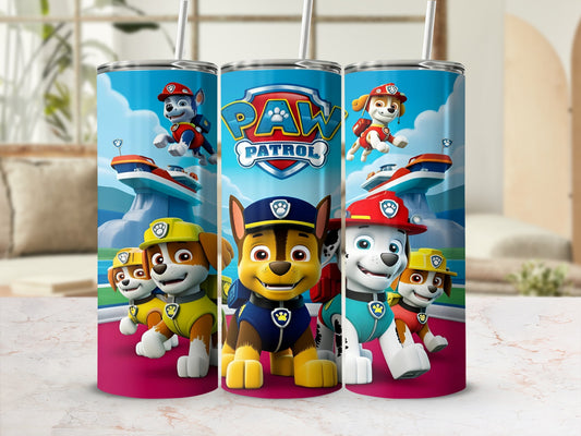 Paw Patrol characters on a blue tumbler with straws, displaying the Paw Patrol logo.