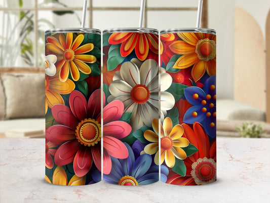 Three tumblers decorated with vibrant, stylized flowers and leaves.
