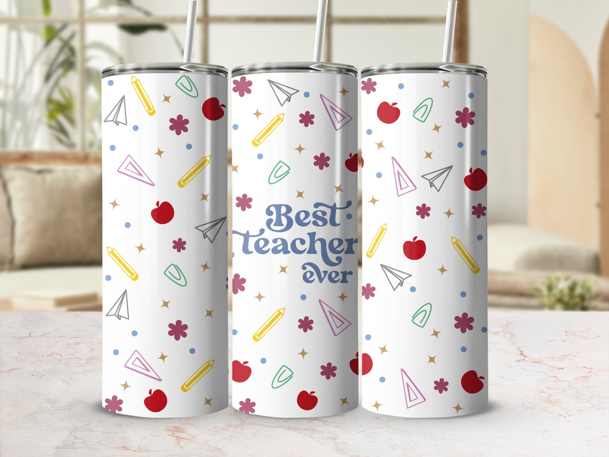 White tumbler with "Best Teacher Ever" and colorful icons of apples, pencils, and stars.