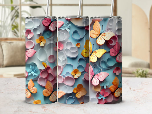 Three tall tumblers with a pastel butterfly and flower design.