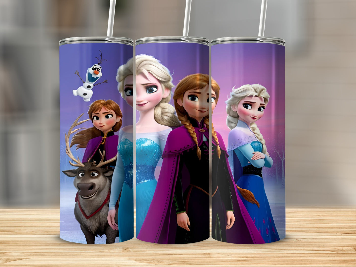 Elsa, Anna, and Olaf from Frozen standing together on a tumbler.