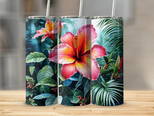 Three tumblers with hibiscus flowers and tropical leaves.