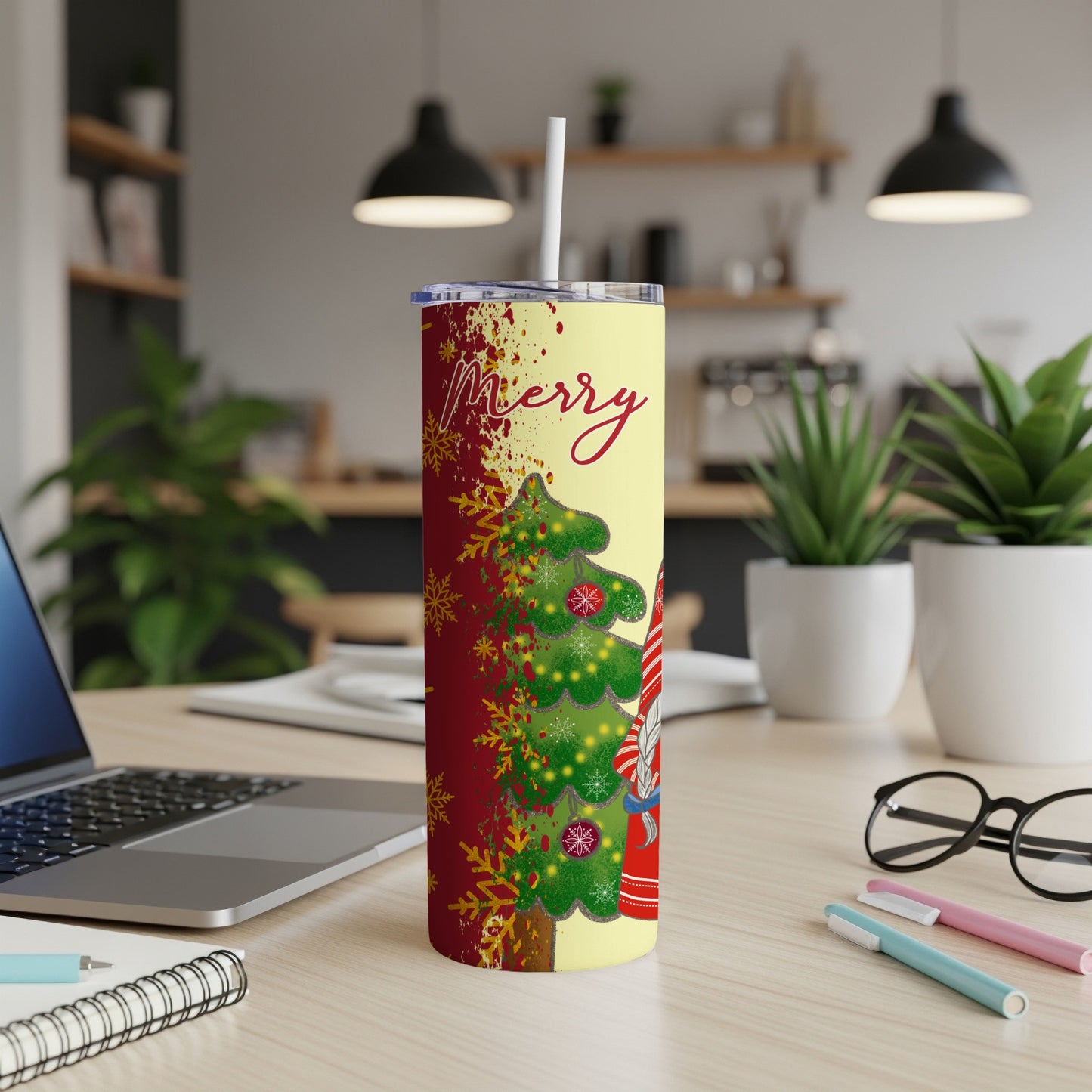 Yellow tumbler with a Christmas tree and gnome design, text reads "Merry".