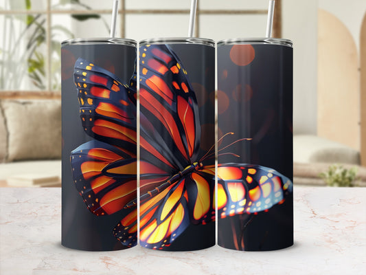 Three tumblers featuring a monarch butterfly design.