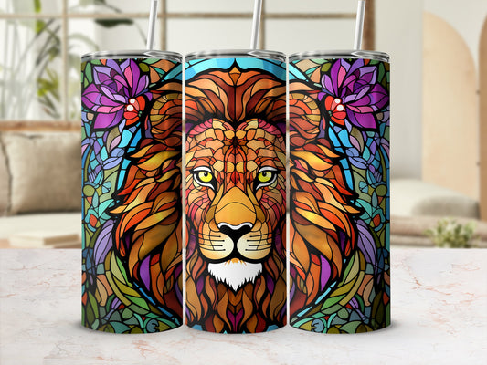 Stained glass style lion face with colorful floral accents on a tumbler.