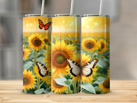 Three sunflowers with butterflies on a sunny field background.