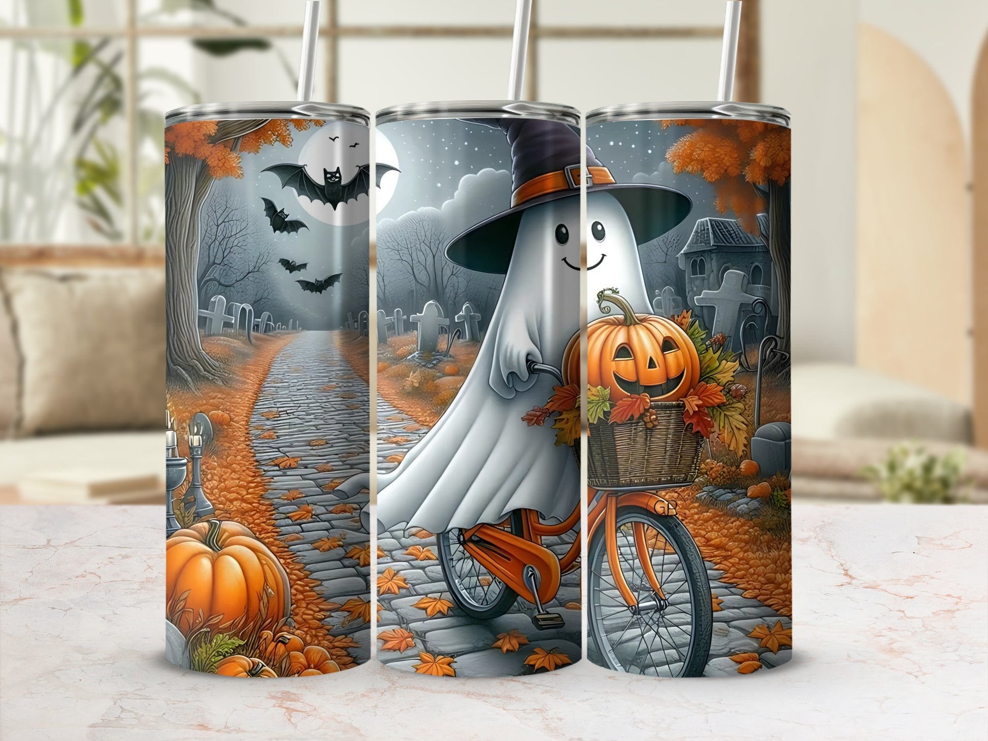 Halloween tumbler with ghost, bats, pumpkins, and graveyard scene.