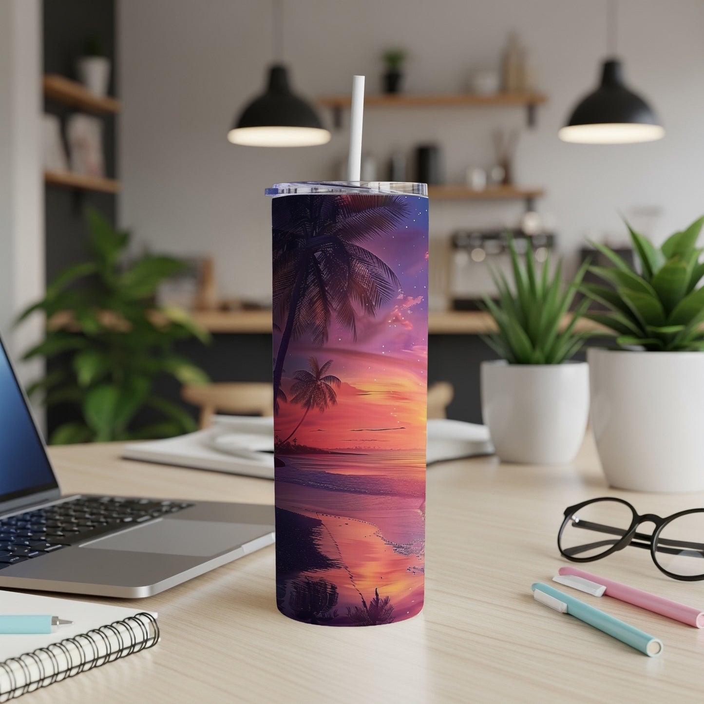 Tropical sunset beach scene on a white tumbler with a straw.