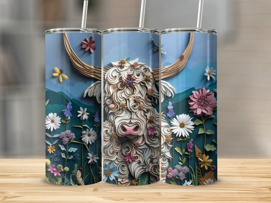 Highland cow with wildflowers and butterflies on a blue tumbler.