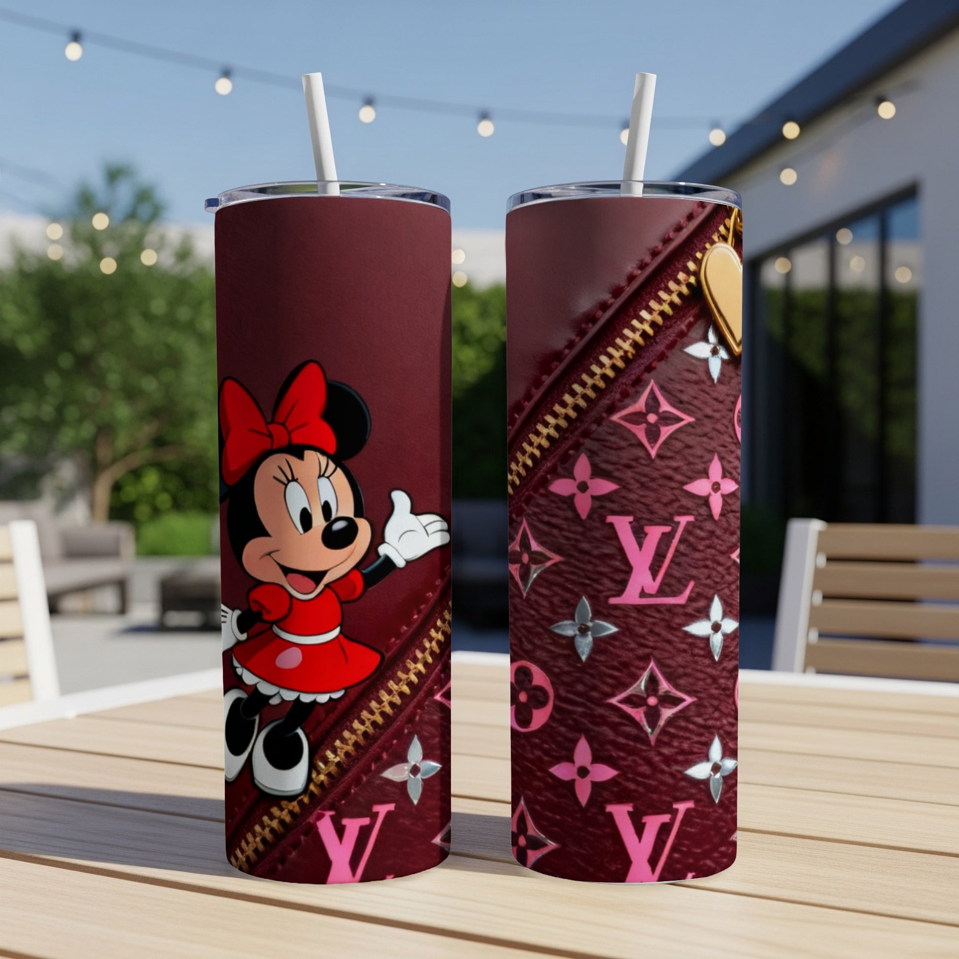 Maroon tumbler with Minnie Mouse on one side and pink LV pattern on the other.