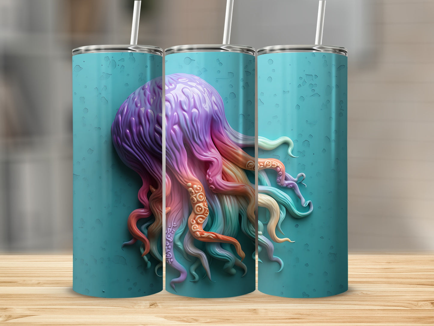 Three tumblers featuring a vibrant, textured octopus design on a teal background.