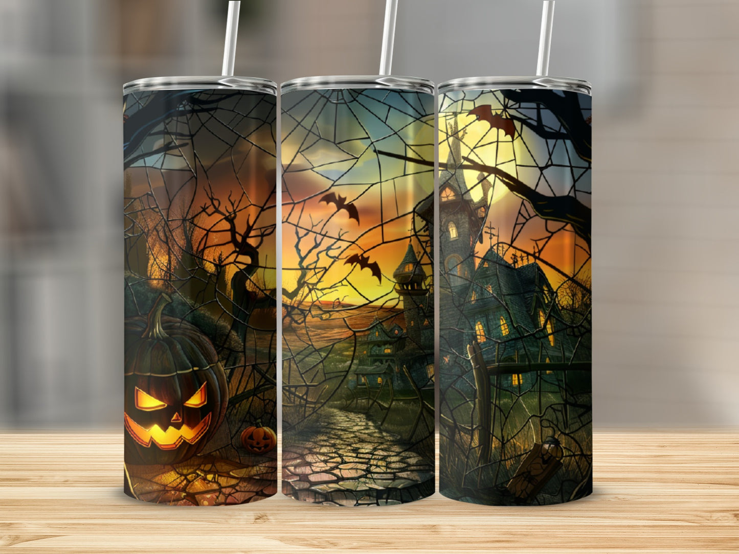 Halloween tumbler with jack-o'-lantern, haunted house, bats, and spooky trees.