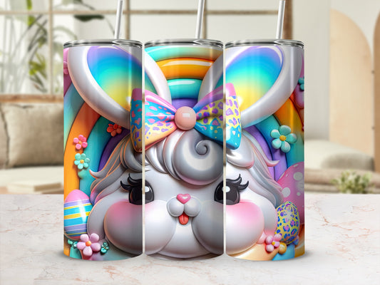 Three Easter bunny tumblers with rainbow and egg designs.