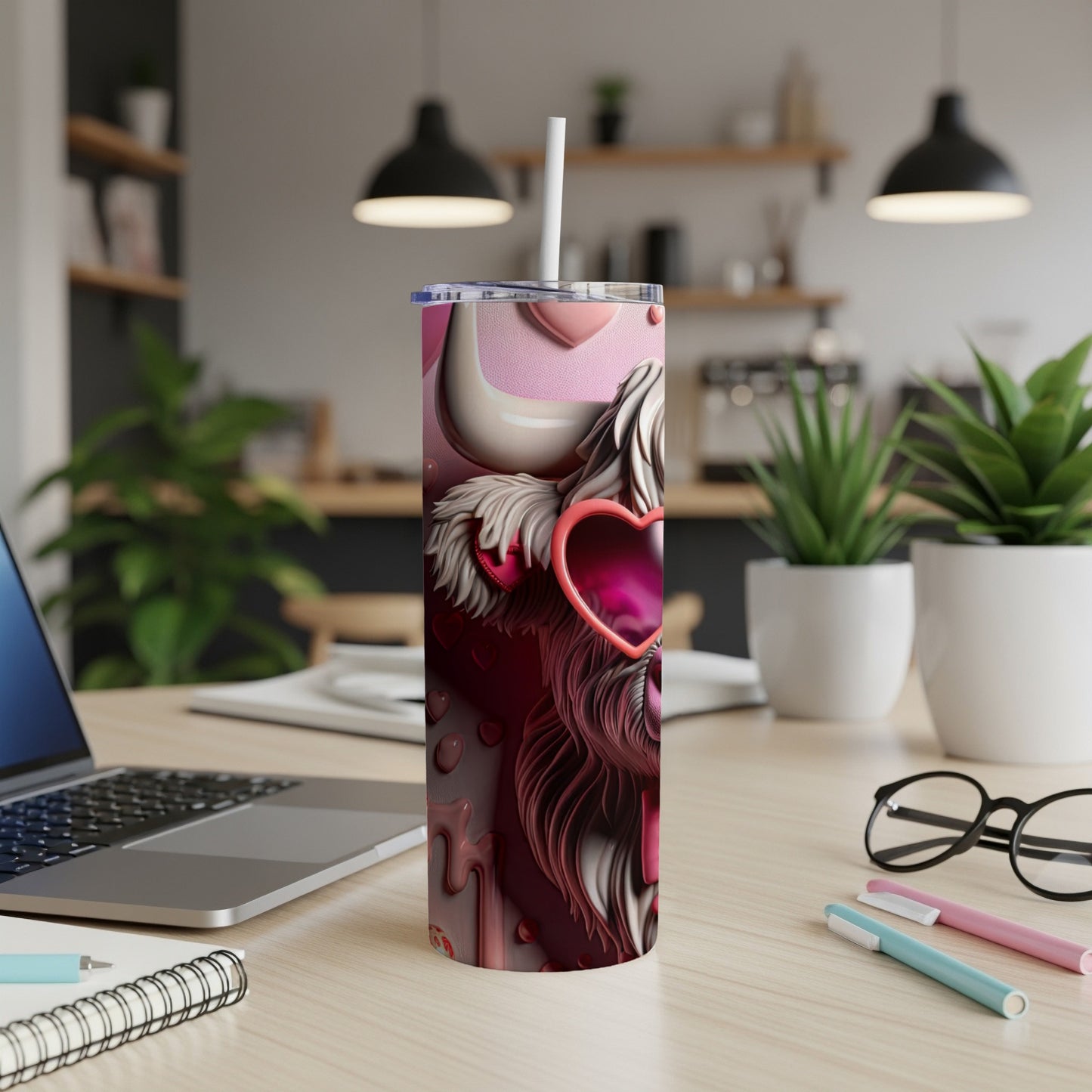 Pink leopard print tumbler with heart sunglasses and straw on desk.