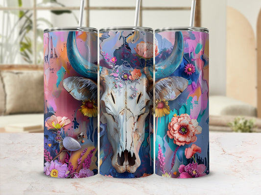 Floral skull tumbler with colorful abstract background.