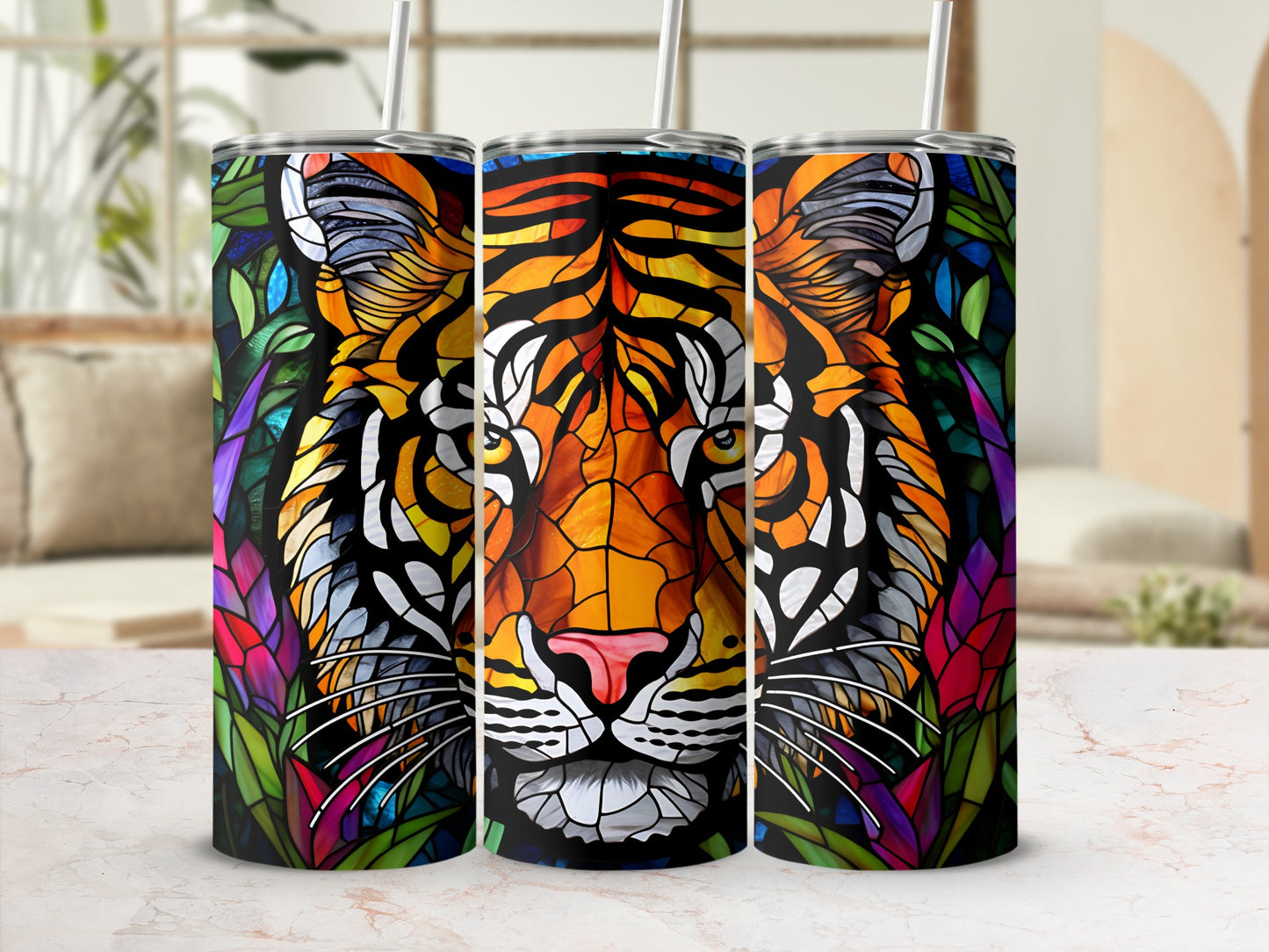 Stained glass tiger face on three tumblers with colorful floral accents.