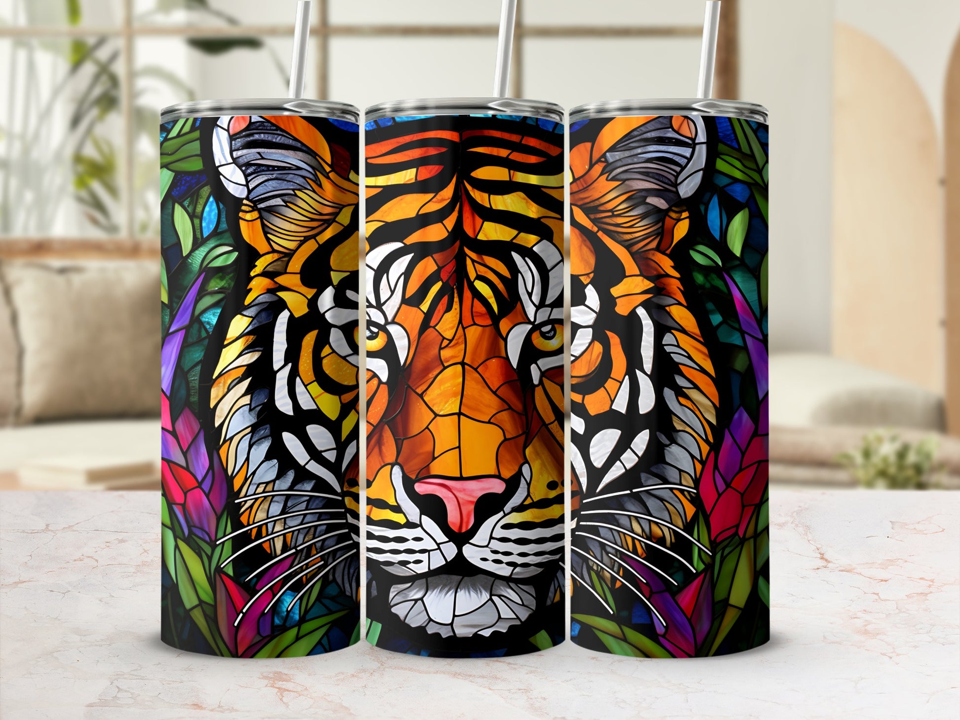Stained glass tiger face on three tumblers with colorful floral accents.