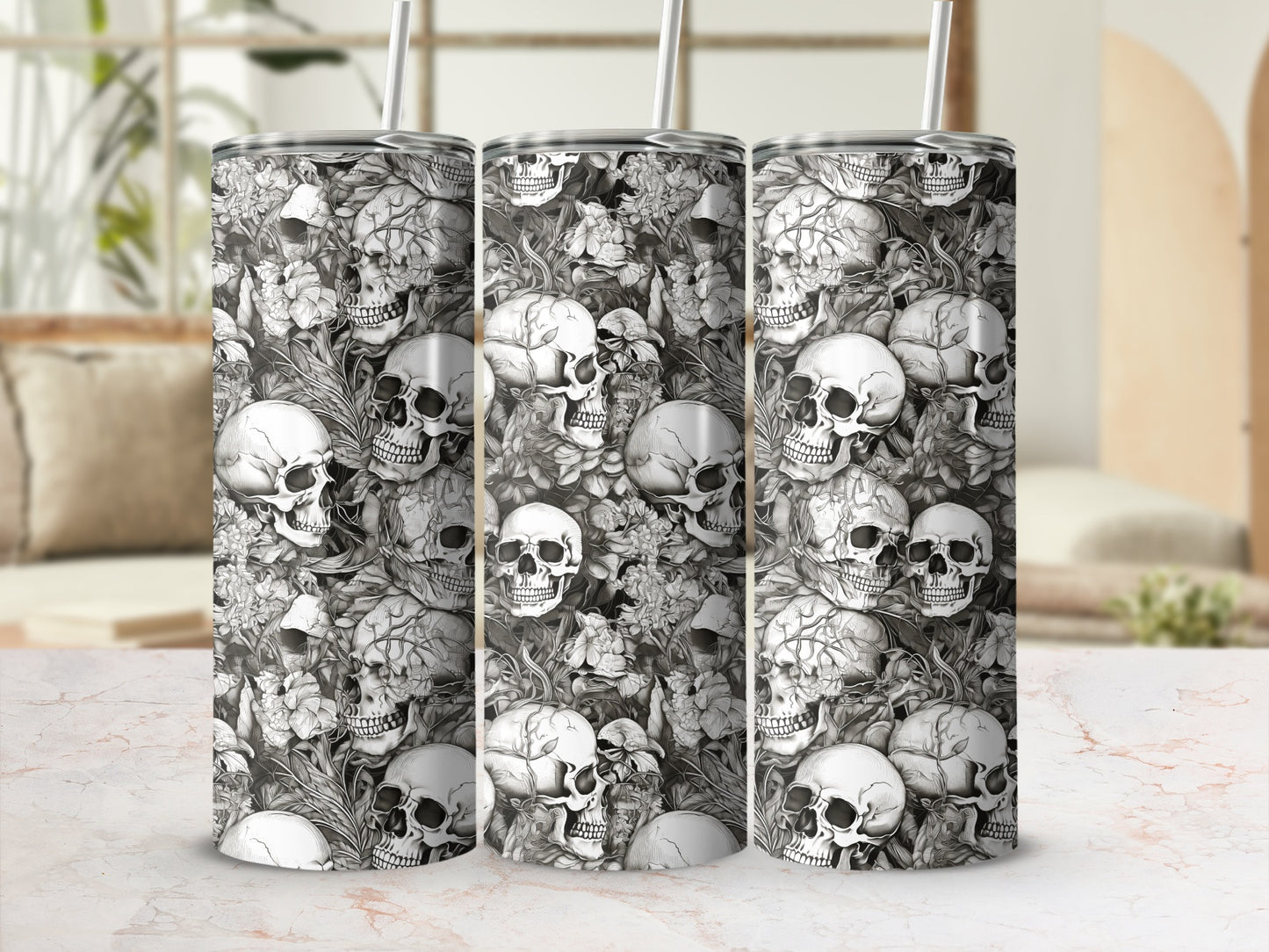 Monochromatic skull and floral pattern on a tumbler.