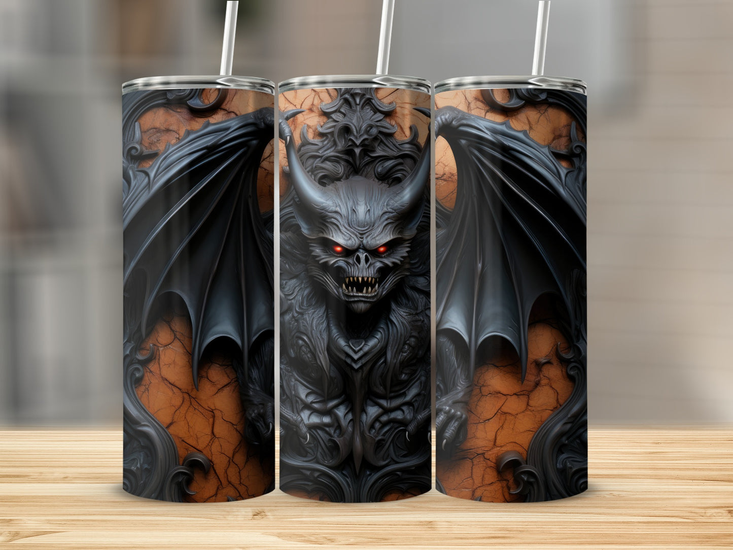 Three tumblers with a detailed dark dragon design on an orange, cracked background.