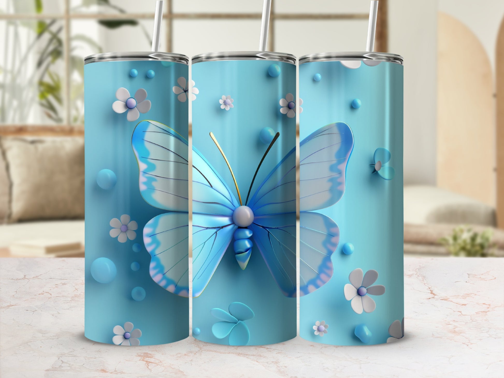 Blue butterfly and floral design on a light blue tumbler with straw.