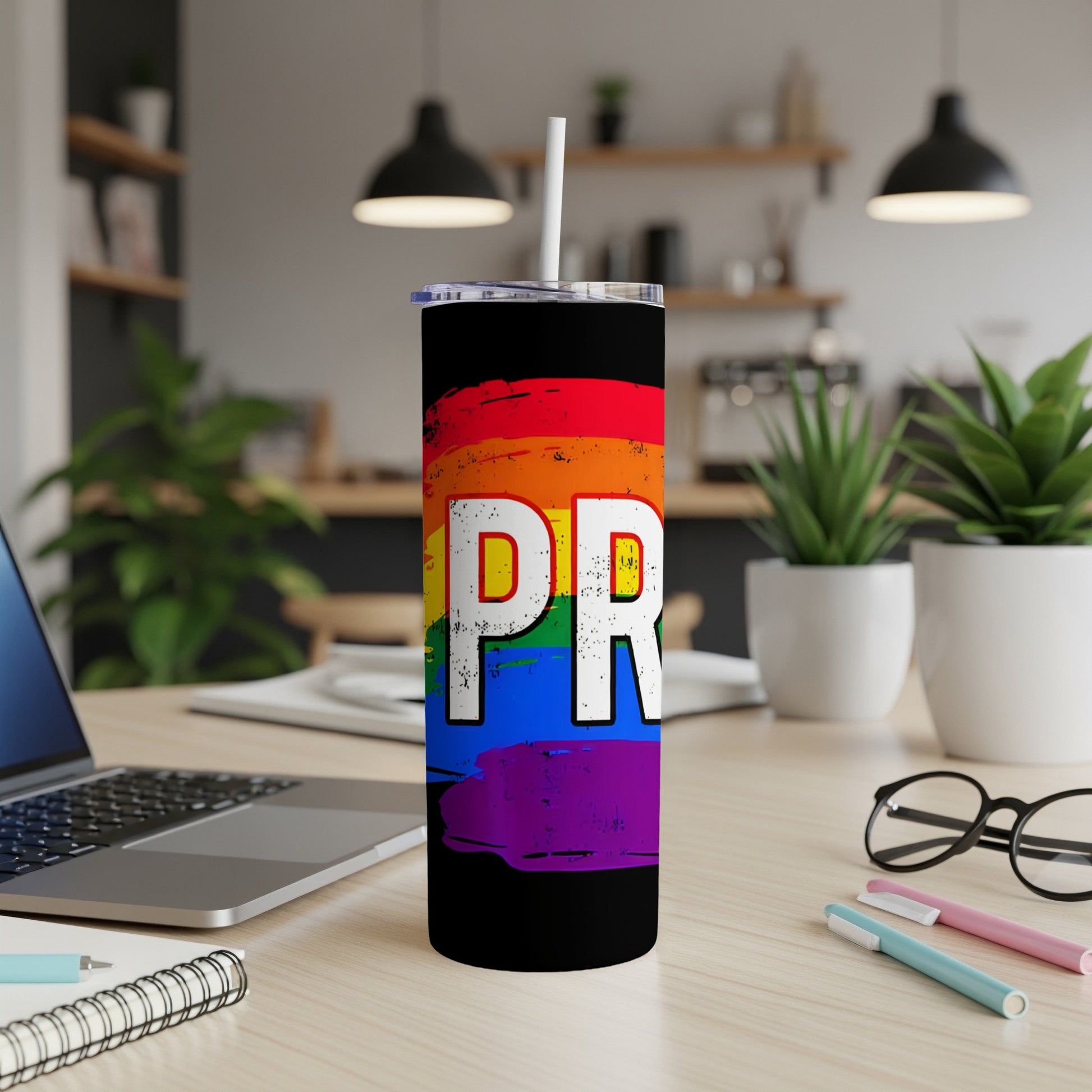 Black tumbler with rainbow flag design and "PRIDE" text.