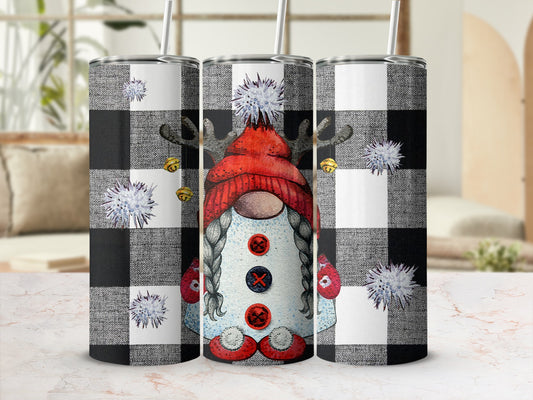 Gnome with reindeer antlers and bells on buffalo plaid background.