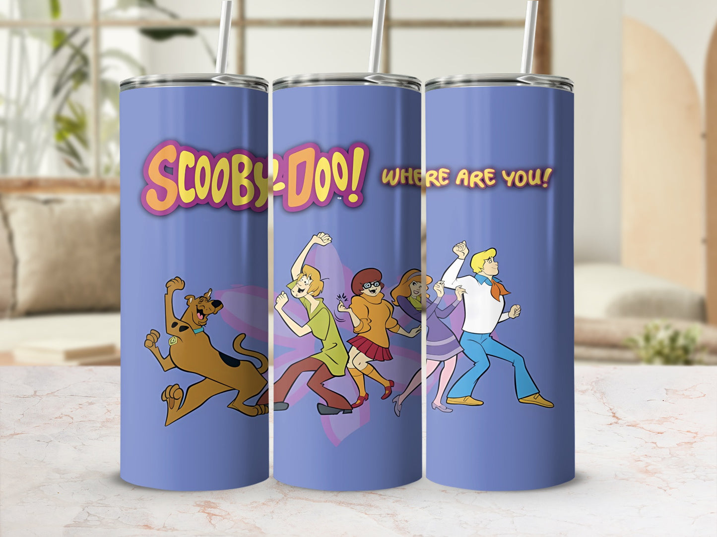 Scooby-Doo Where Are You! design on three purple tumblers with characters.