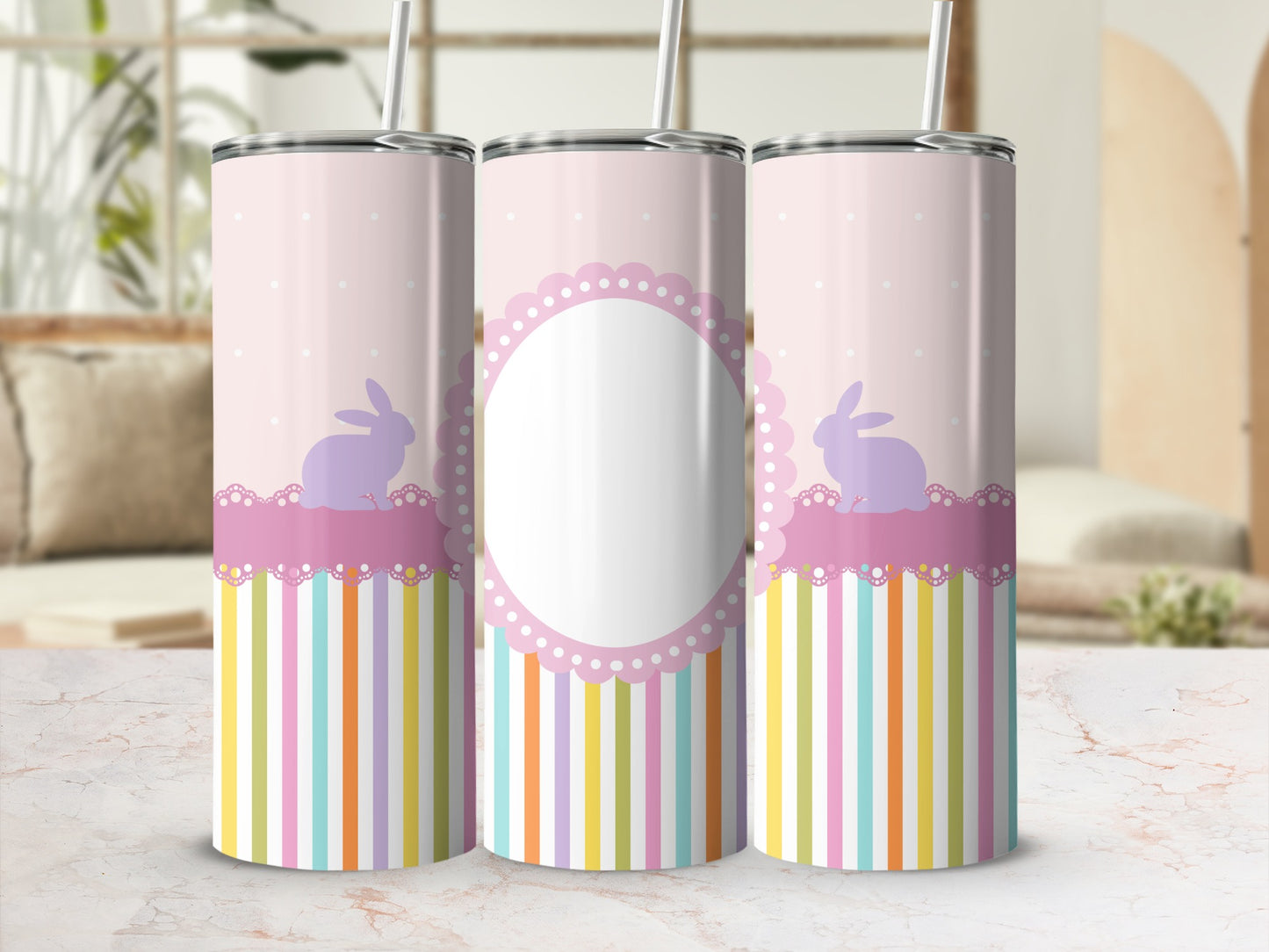 Three pastel bunny-themed tumblers with striped bases and decorative scalloped frames.