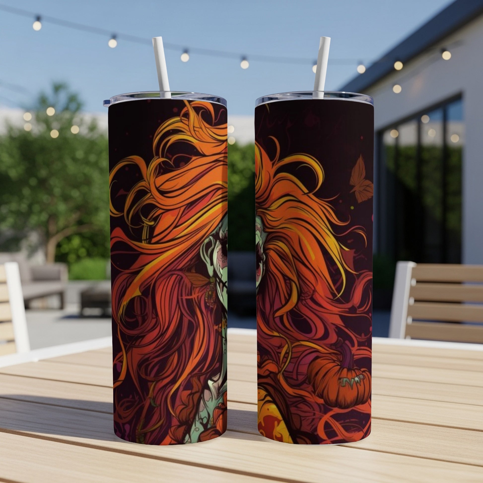 Two tumblers with a zombie and pumpkin Halloween design sit on a table.