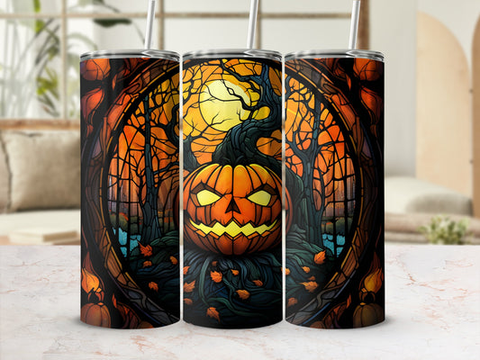 Halloween tumbler with a jack-o'-lantern and spooky forest scene.