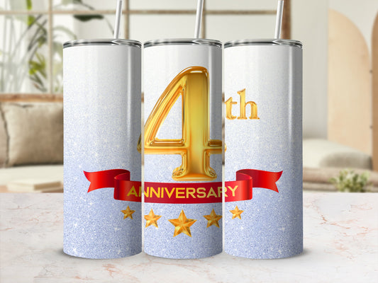 Gold "4th Anniversary" text on a glittery tumbler with stars and a red ribbon.