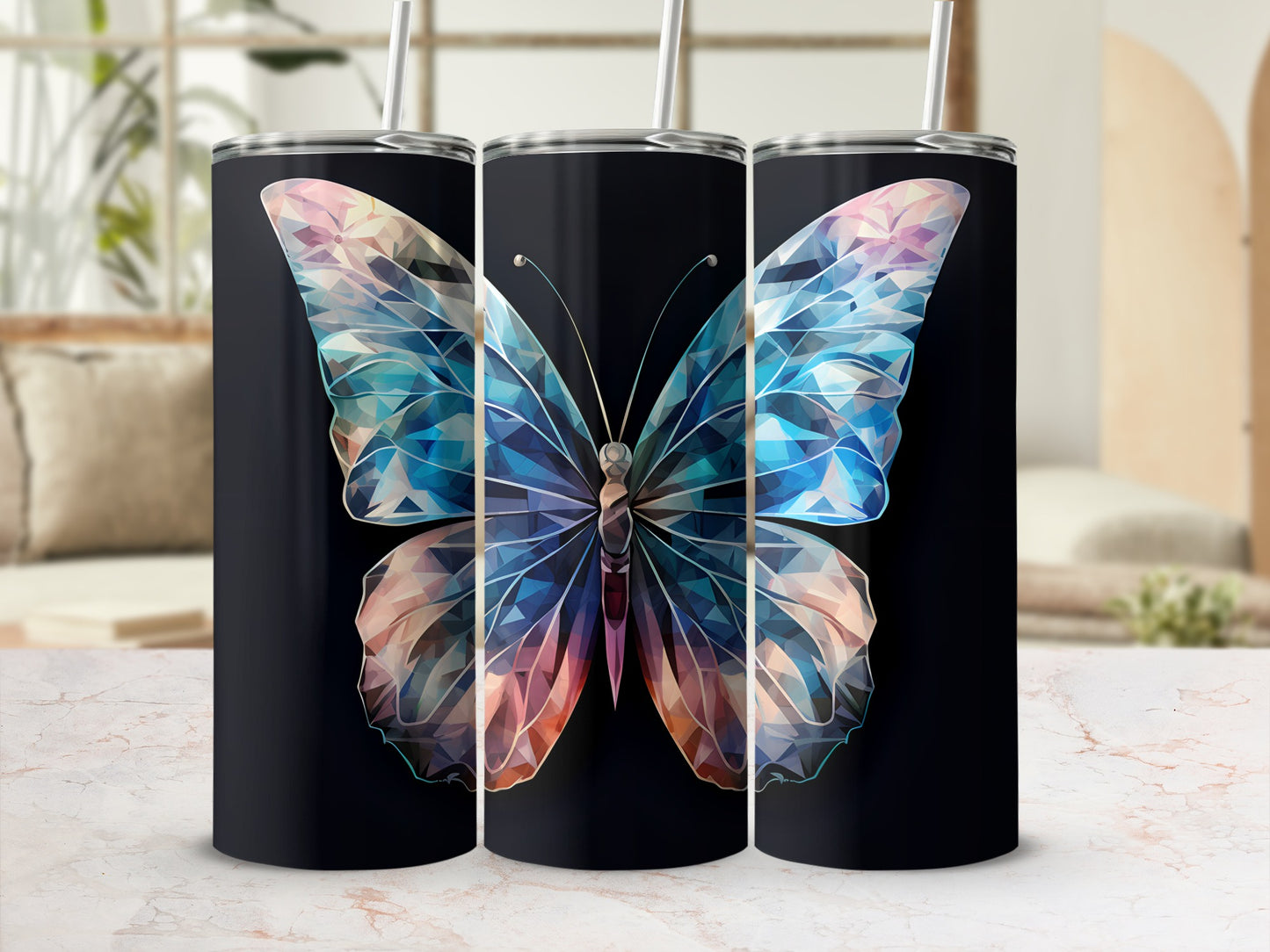 Black tumblers with faceted butterfly design and straws.