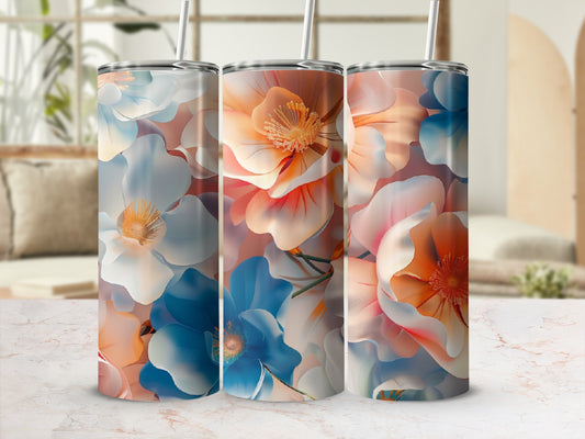 Three tumblers with a floral pattern of blue, white, and orange flowers.