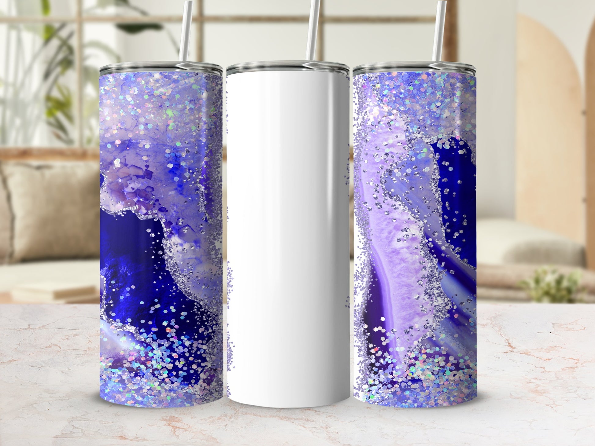 Two purple agate and glitter tumblers with straw.