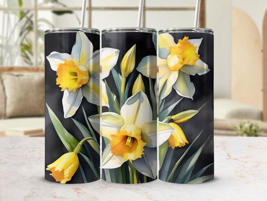 Three tumblers with a yellow and white daffodil floral design.