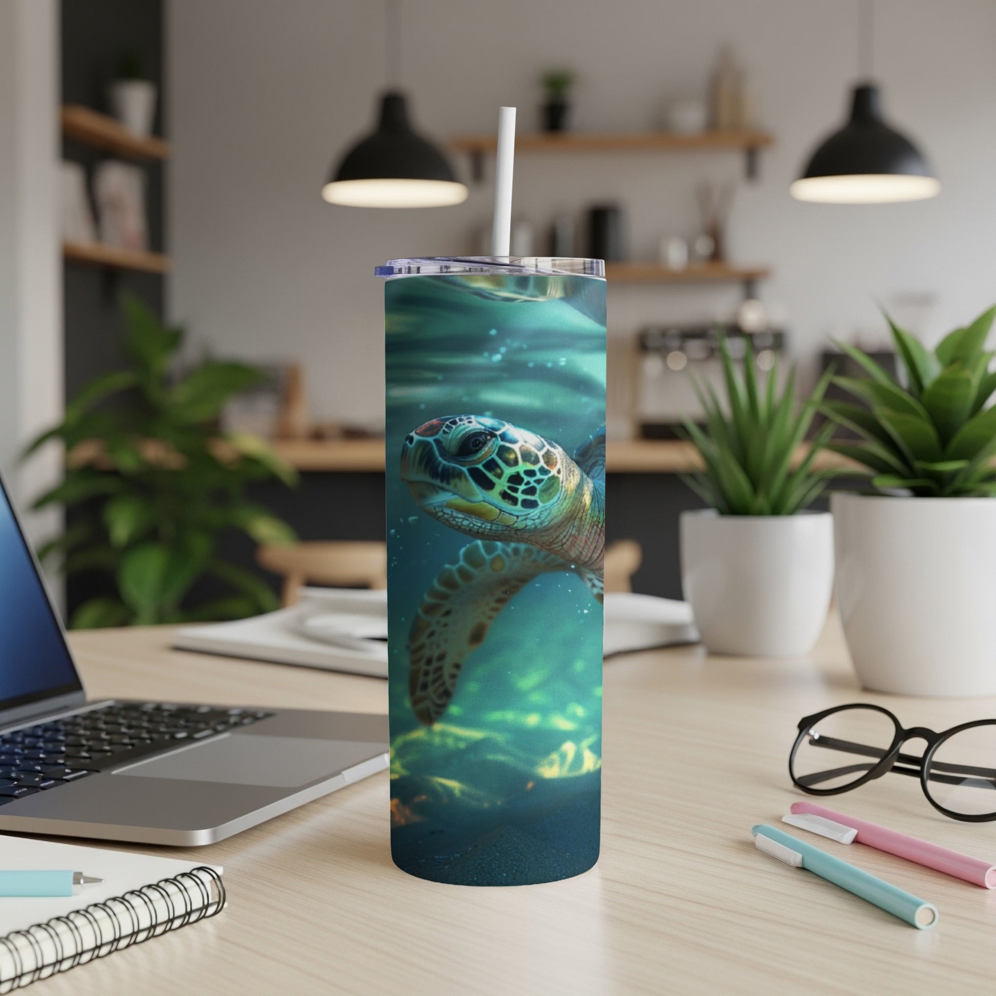 Sea turtle swimming underwater on a cylindrical tumbler.