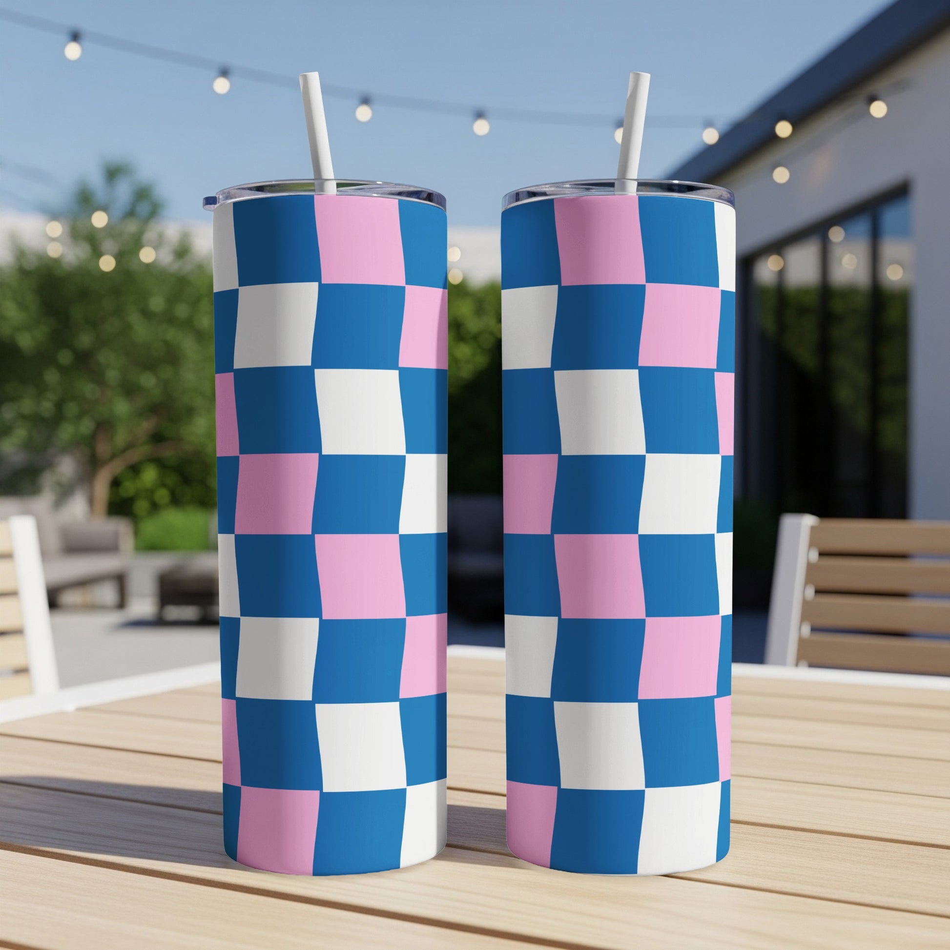 Two tumblers with a checkered pattern of blue, pink, and white.